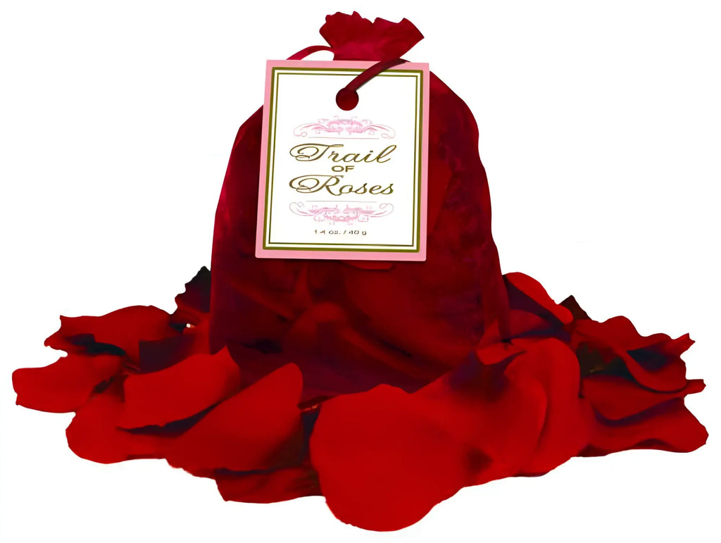 A red velvet pouch labeled trail of roses filled with rose petals from kheper games trail of roses product