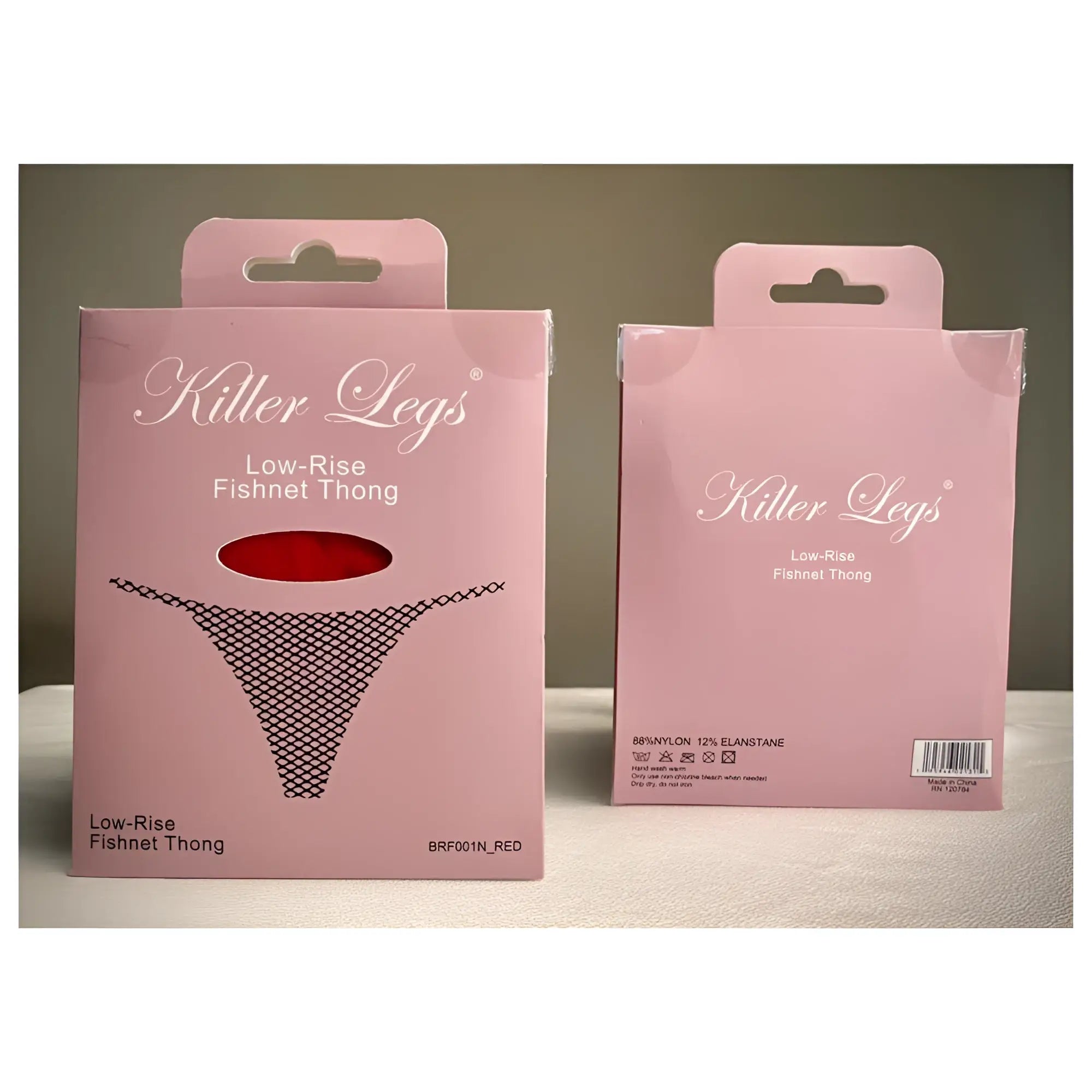 Pink packaged killer legs low-rise fishnet thong in red showing the back side in mesh net g string black one size