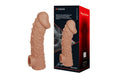 Tan silicone kokos cock sleeve 2 large with textured bumpy surface and hollowed out base shown from back side