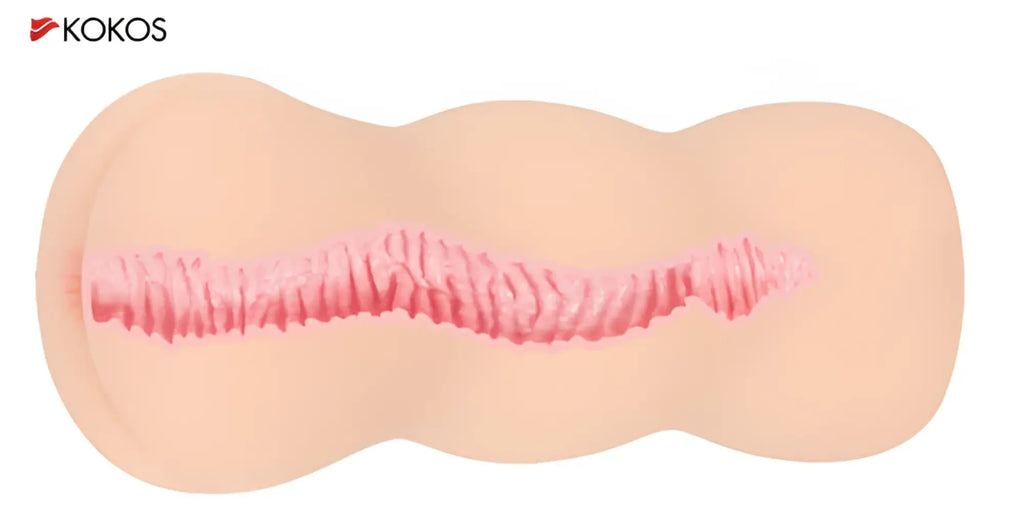 Beige silicone kokos masturbator anal toy with pink textured ridges along its center for enhanced stimulation