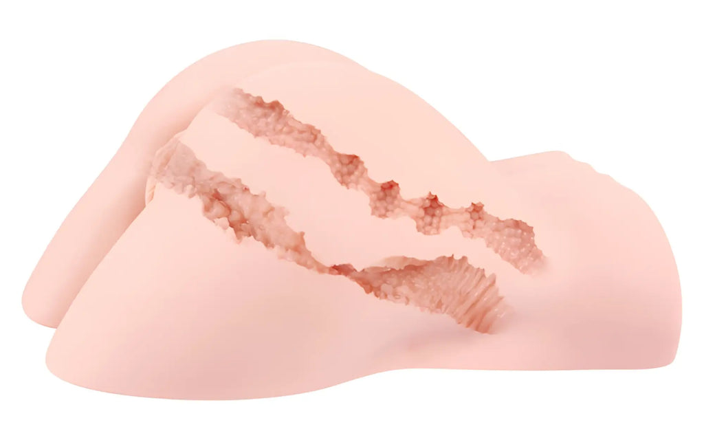Pink silicone adult toy kokos real hip hera with textured ridged interior surfaces for realistic stimulation
