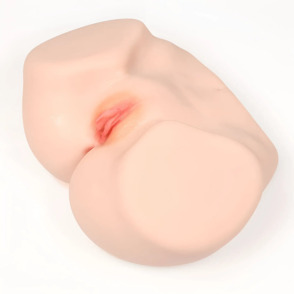 A realistic silicone Kokos Vanilla Onahole Edn 4 pussy and ass 1:1 torso with smooth flesh tone and pink detailing