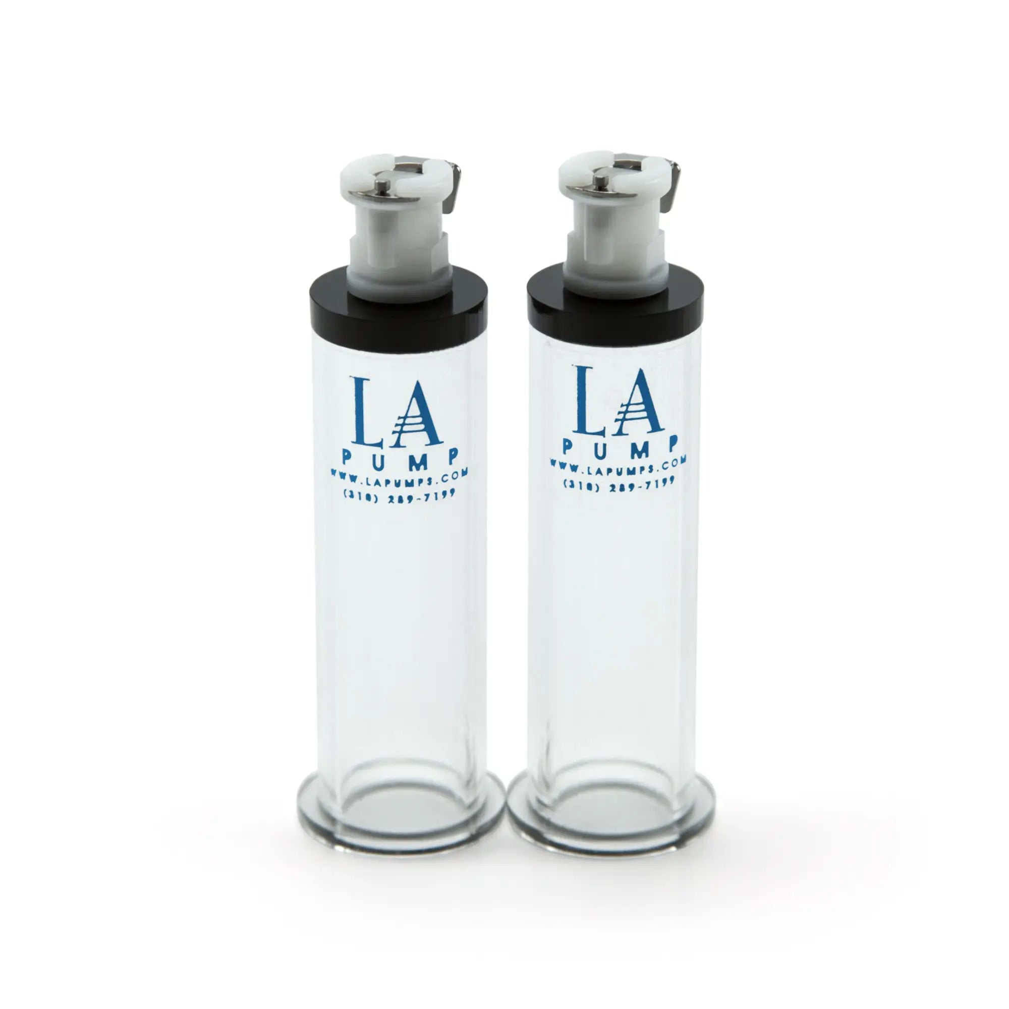 Two transparent glass la pump nipple enlargement cylinders with black caps and silver pump mechanisms 16mm diameter