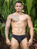 Black briefs from little boy blue design shane bikini featuring sleek black fabric, shown from the back side