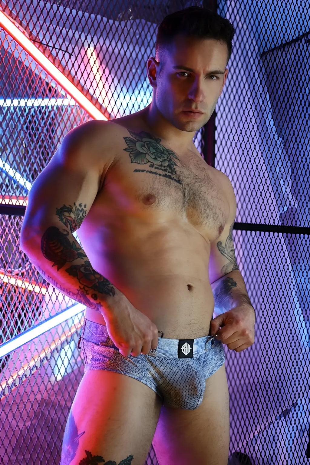 Blue patterned loaded denim brief with black and white logo on waistband in a soft cotton blend