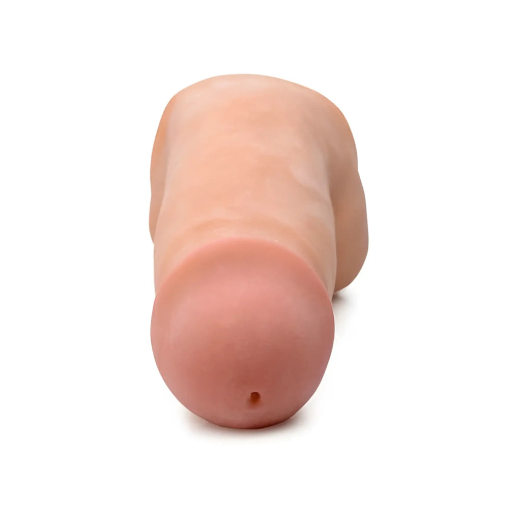 Realistic peach-colored silicone Loadz 7in dual density squirting dildo with rounded head and tapered shaft