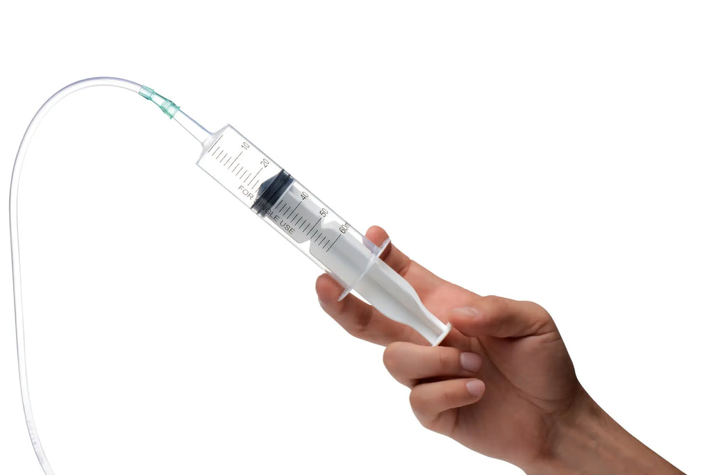 Loadz squirting dildo 8in with clear plastic syringe black plunger and green tinted tubing for squirting feature