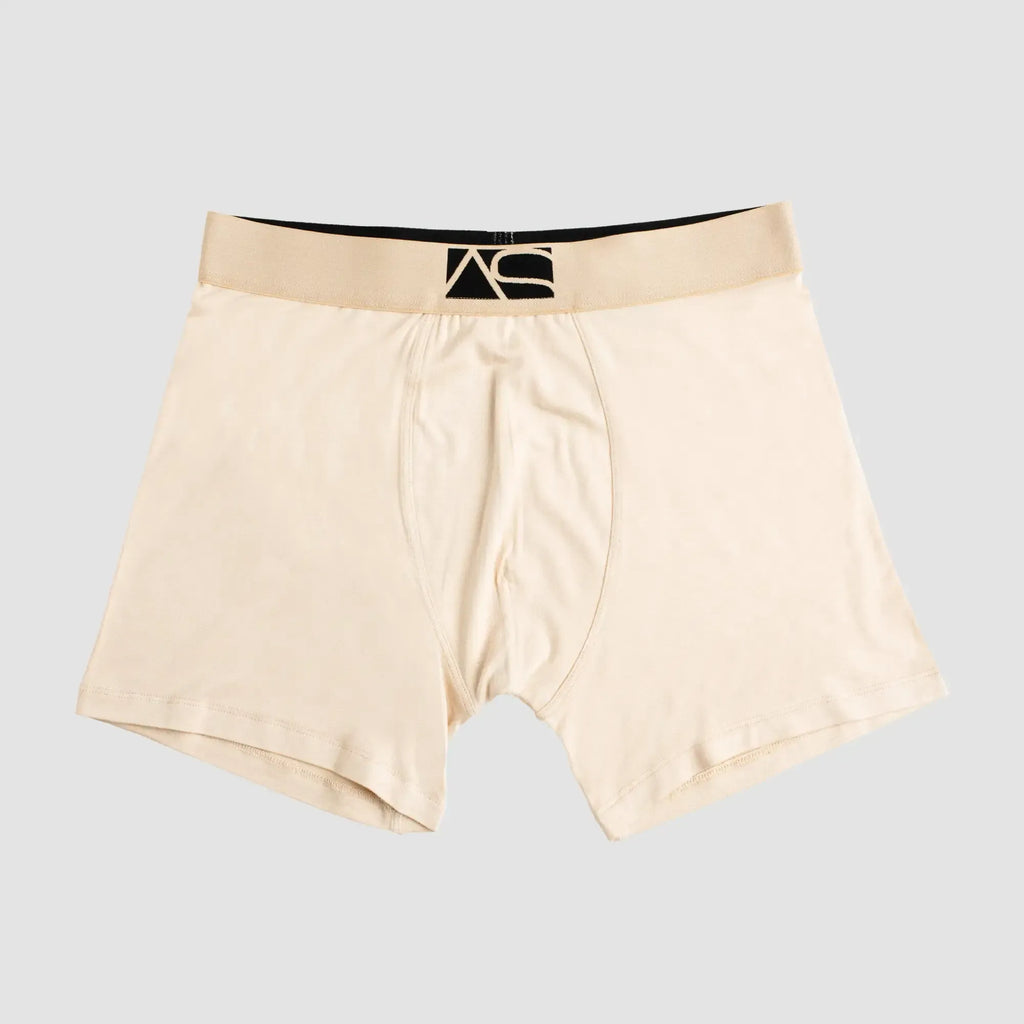 Beige long trunks boxer briefs with black and beige waistband featuring the as logo in front view