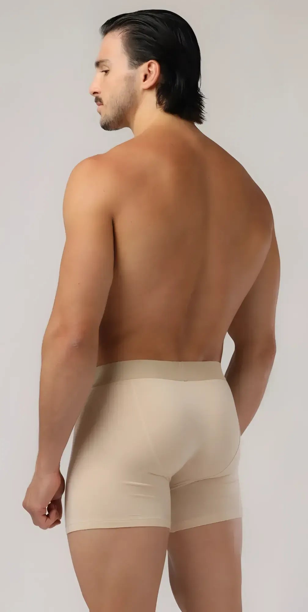Beige menâs long trunks boxer briefs with smooth form fitting design for comfortable everyday wear