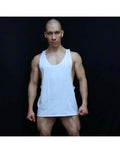 White loose muscle tank top by Arroyman featuring wide armholes and a relaxed fit worn by a model.