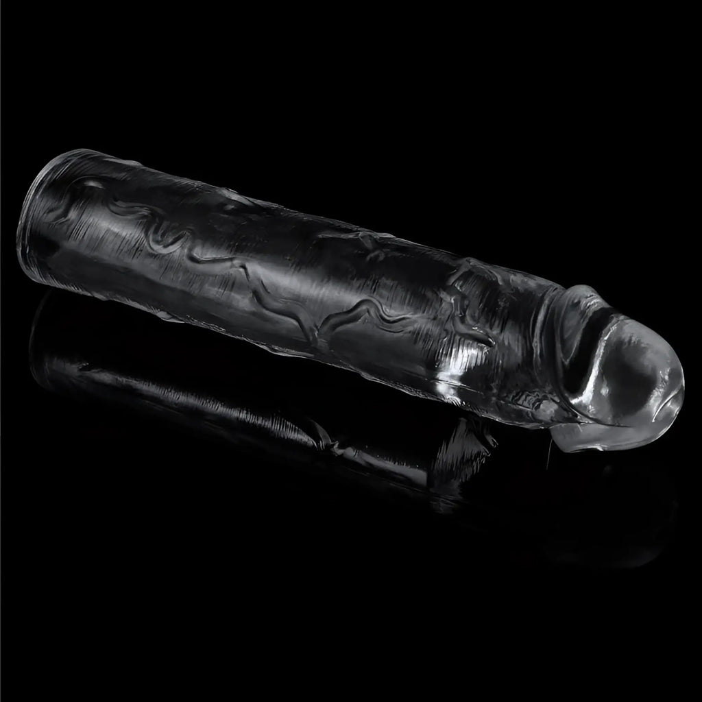 Lovetoy clear penis extender sleeve plus 2in transparent silicone with embossed wave-like patterns along its length