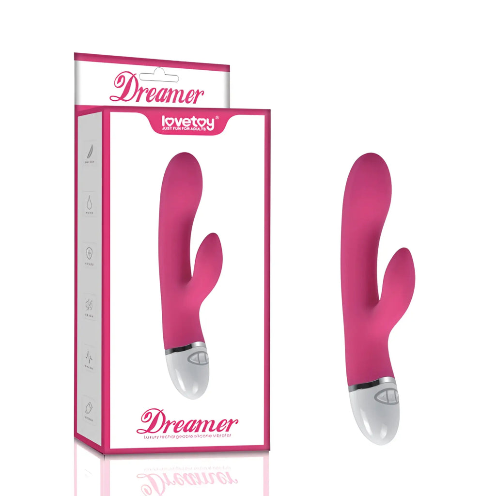 Pink silicone Lovetoy Dreamer rabbit vibrator with silver base and control button featuring 7 modes and rechargeable design