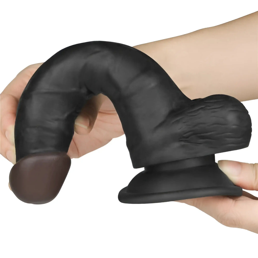 Black silicone phallic-shaped dildo with textured base and rounded head from lovetoy easy strap on set 7.5in