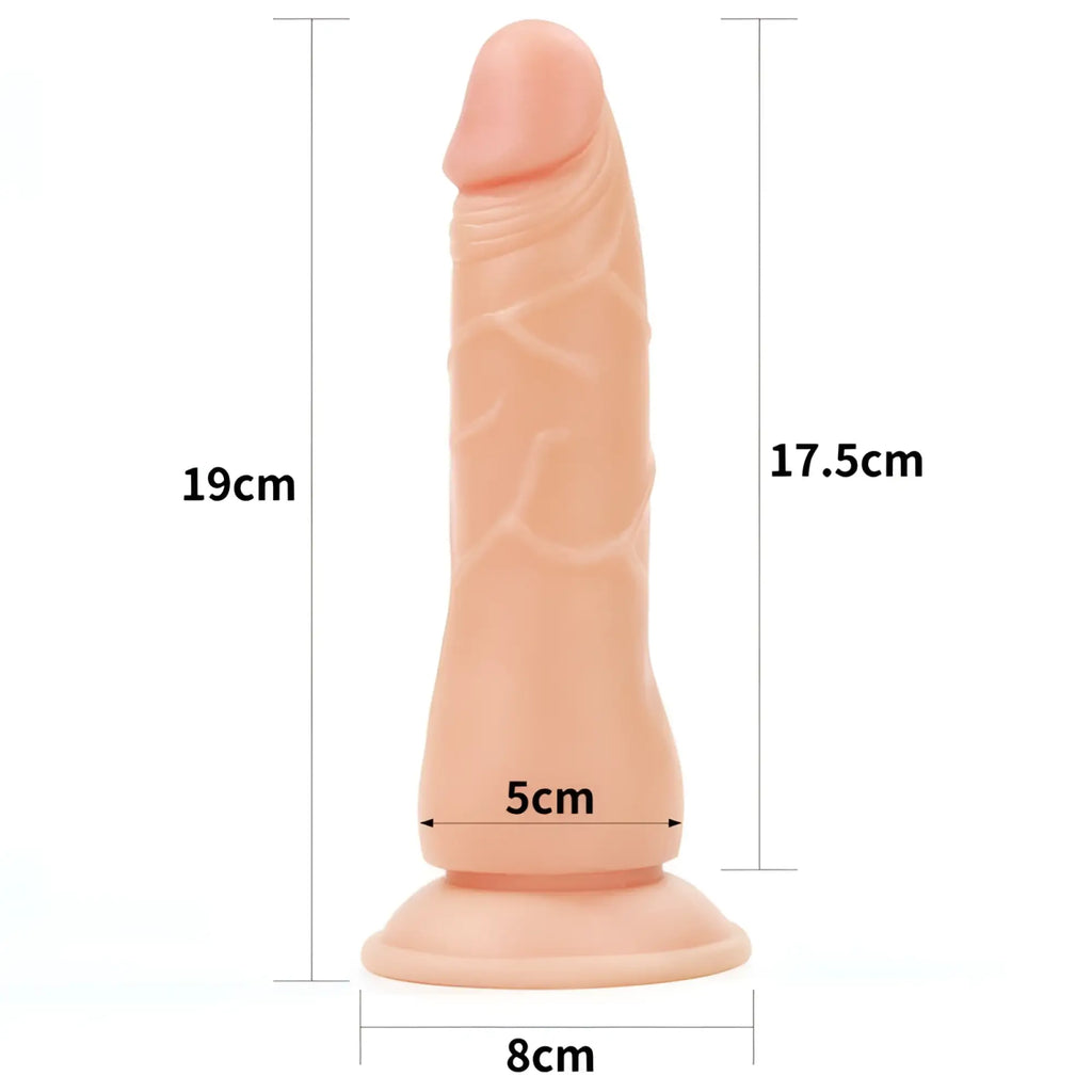 Peach-colored silicone dildo with realistic texture and rounded base in lovetoy easy strap on set 7.5in