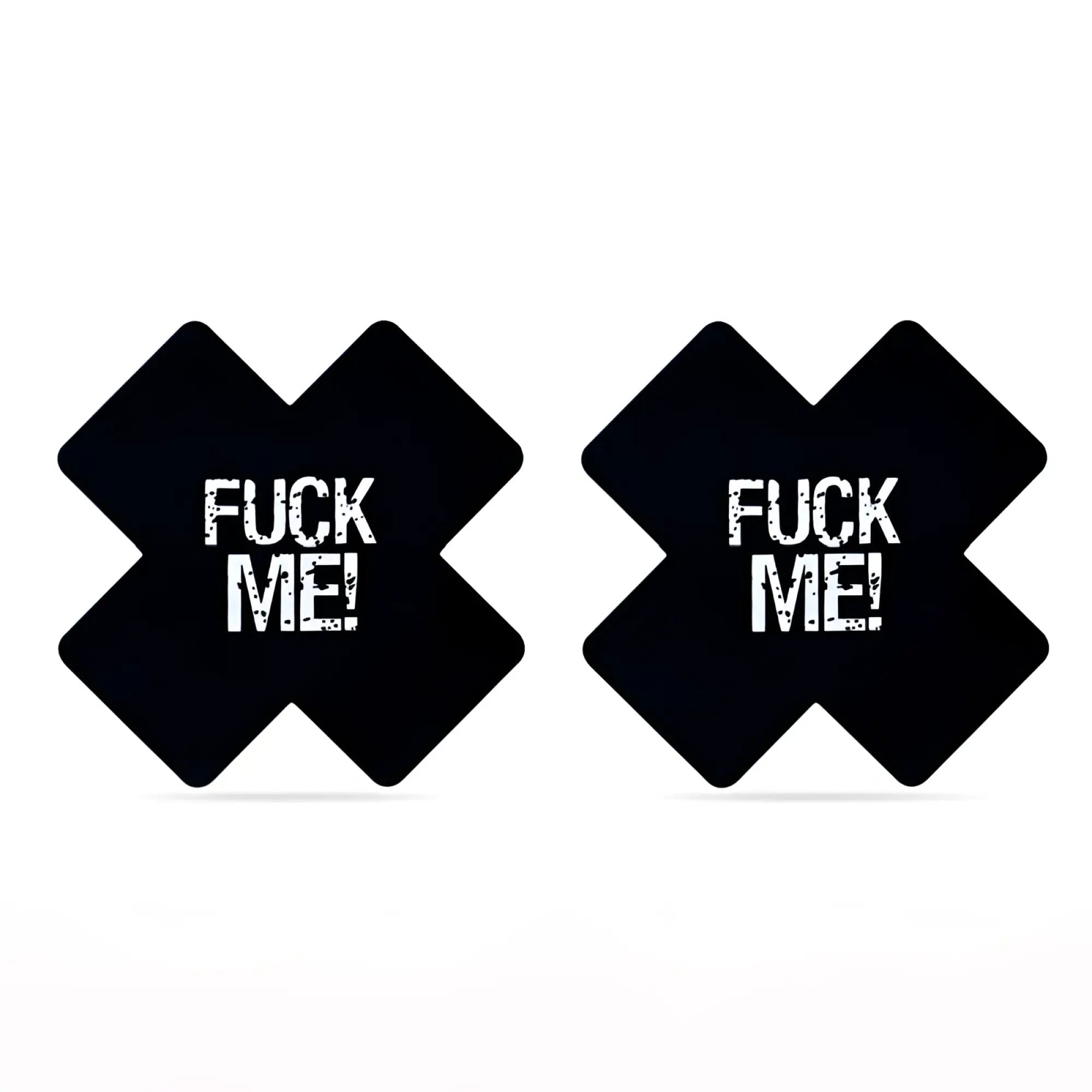 Black x-shaped adhesive breast pads with bold white fuck me text in distressed font lovetoy fuck me cross pattern nipple pasties twin pk
