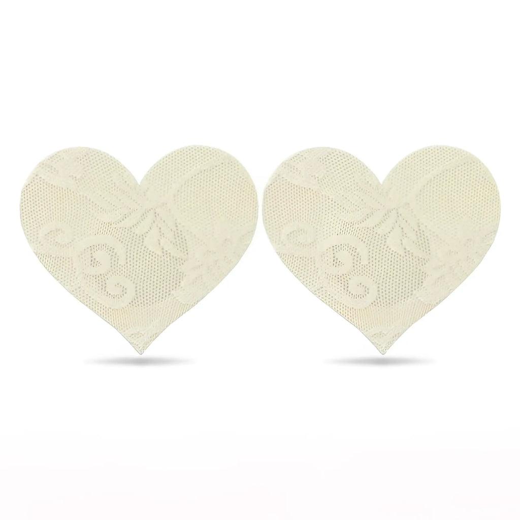 Cream-colored lace heart-shaped adhesive nipple pasties twin pack by lovetoy for discreet coverage