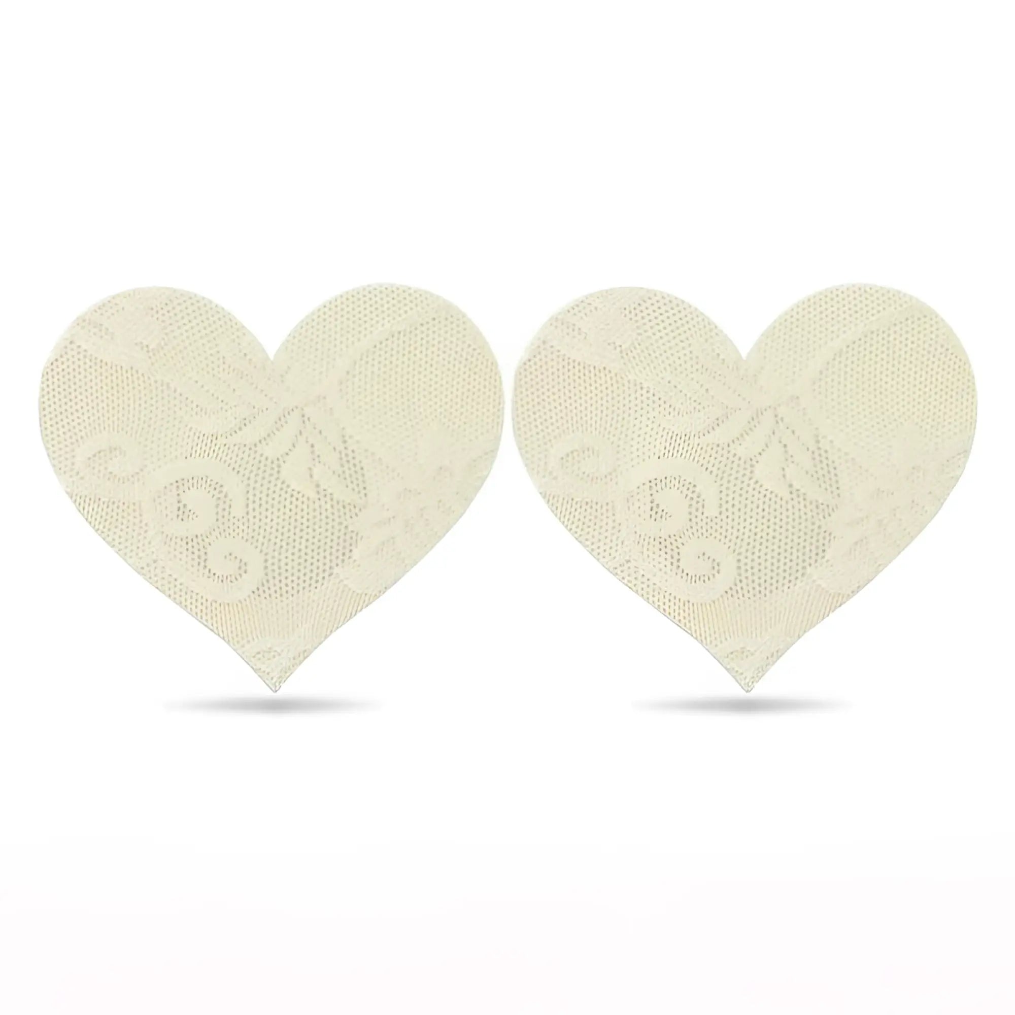 Cream-colored lace heart-shaped adhesive nipple pasties twin pack by lovetoy for discreet coverage