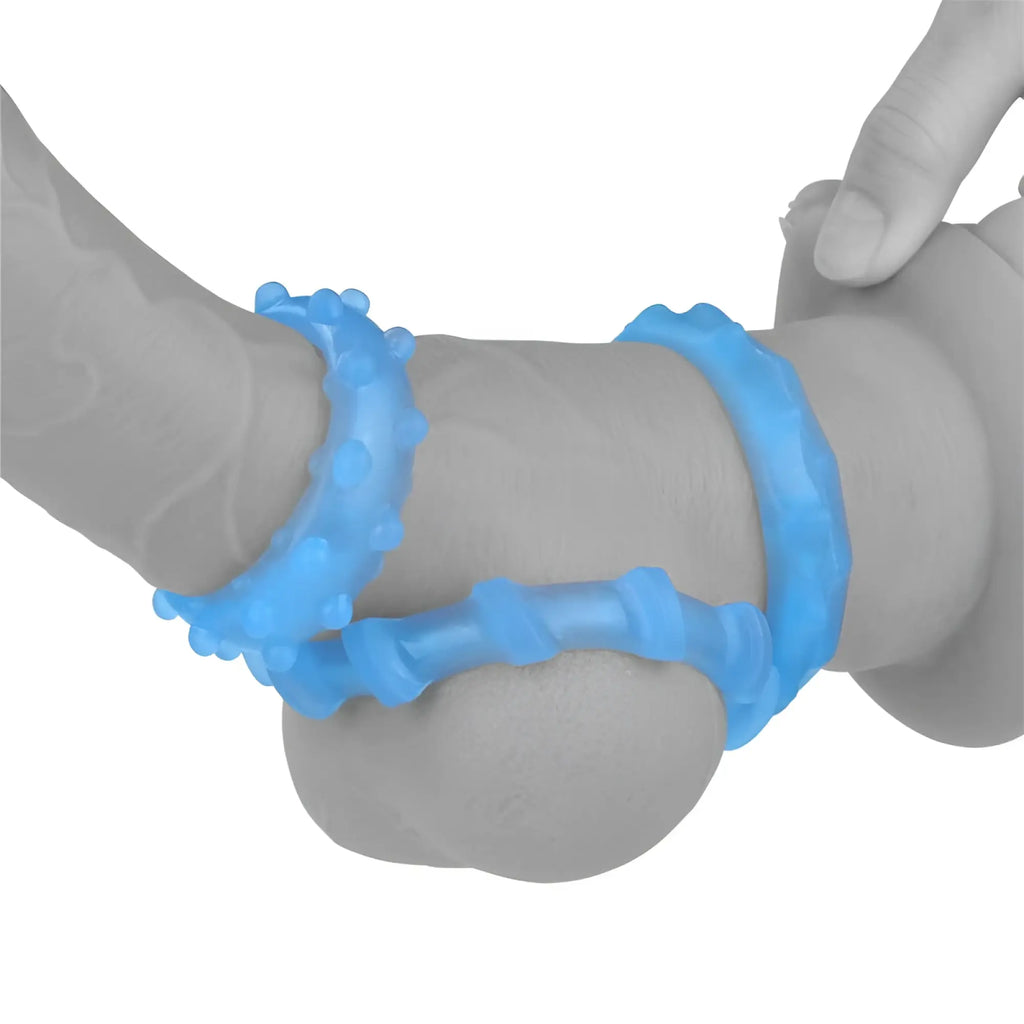 Blue silicone anal ring with textured bumpy surface and segmented design from lovetoy lumino play penis rings 3 pc set