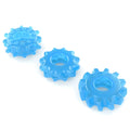 Three translucent blue silicone gear-shaped penis rings with varying designs from lovetoy lumino play 3 pc set