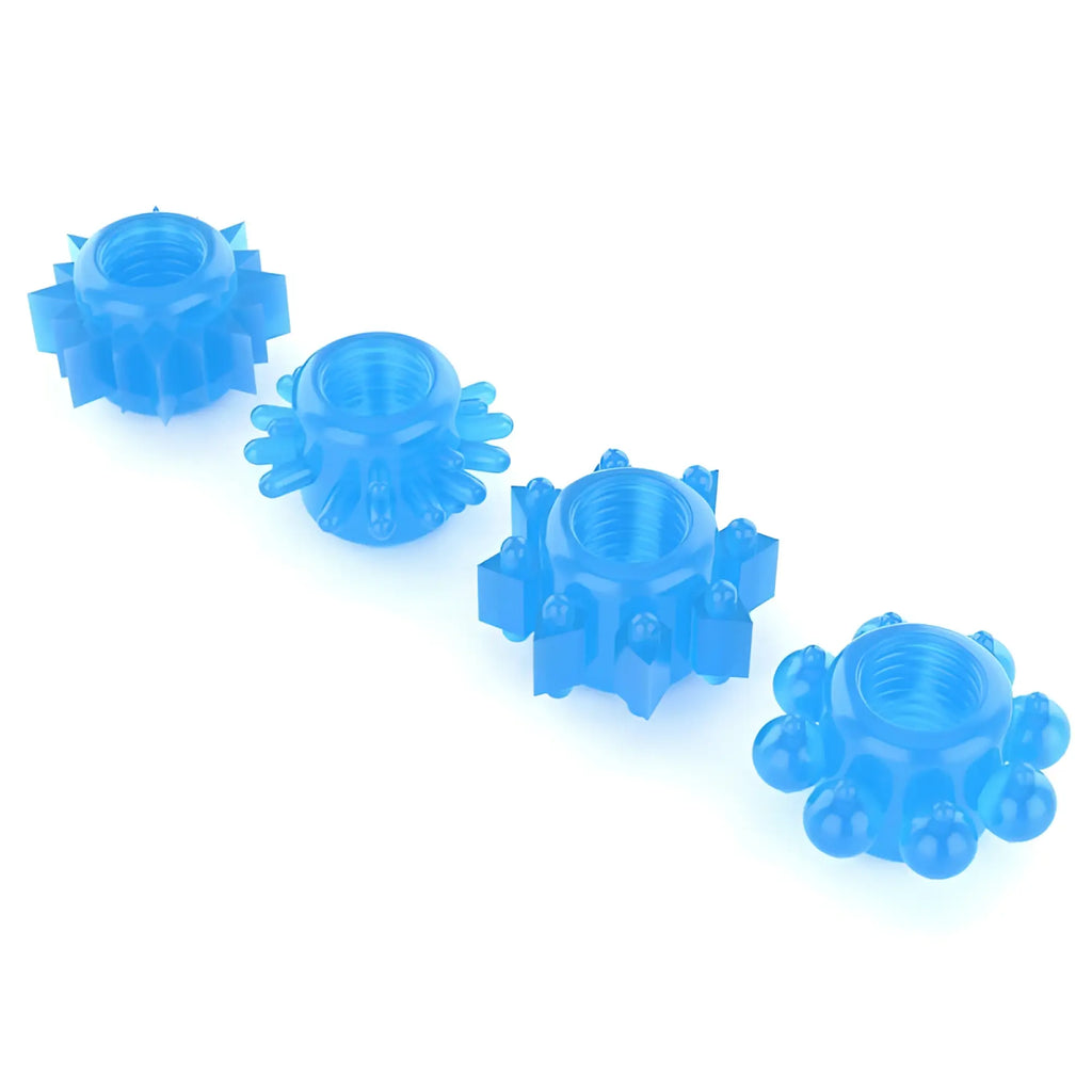 Set of four translucent blue plastic lovetoy lumino play penis rings with gear shape and threaded centers for stimulation
