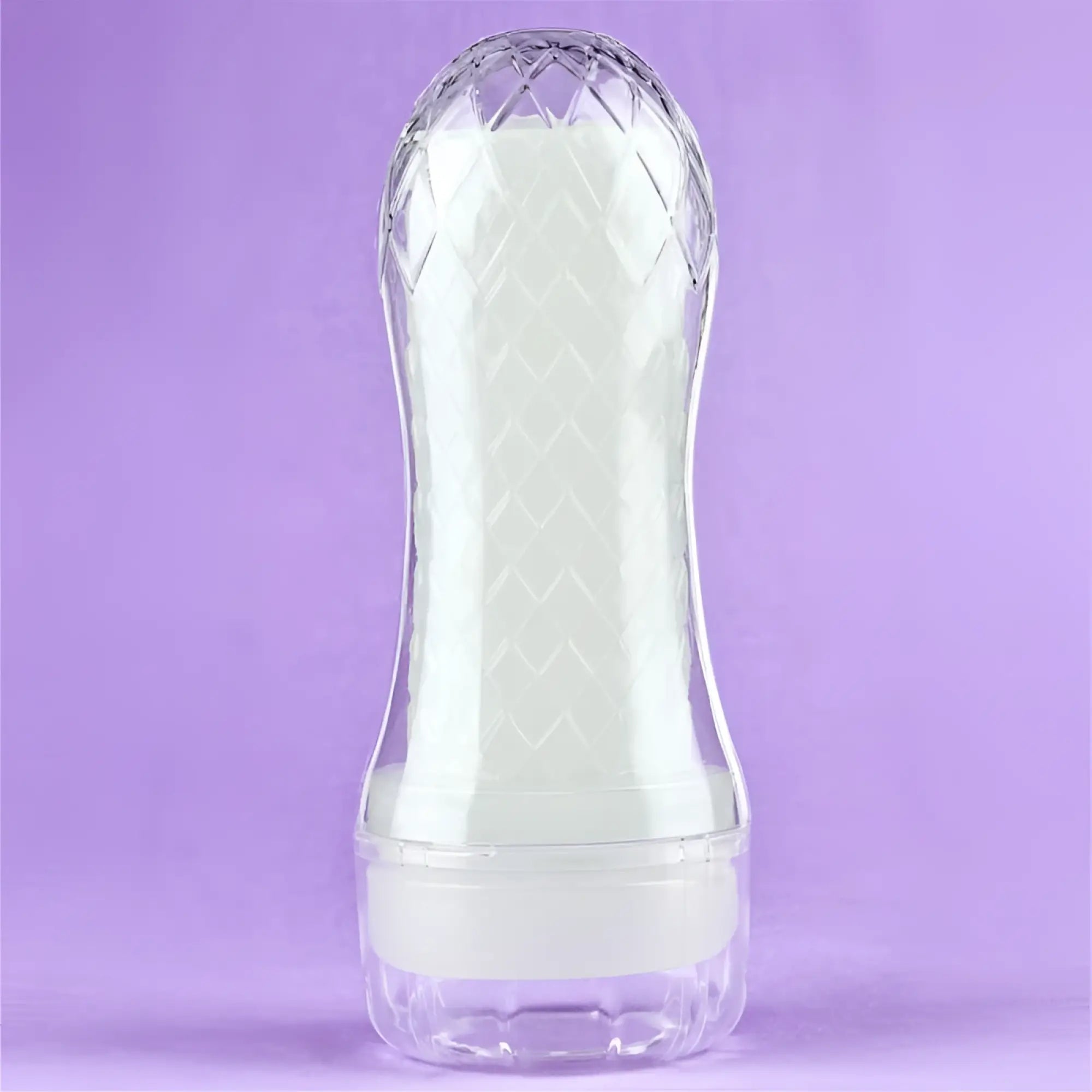 Clear plastic lovetoy lumino play pocket masturbator with white textured inner insert and diamond-patterned top