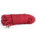 Red braided silk bondage rope with silver metal balls at each end from lovetoy rebellion reign crimson 10m collection