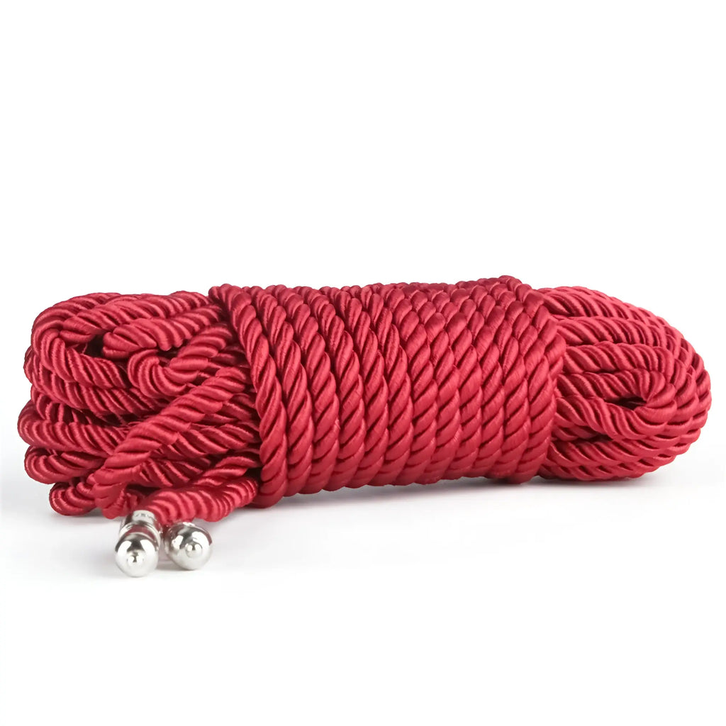 Lovetoy rebellion reign crimson 10m silky bondage rope in red with silver metal balls at each end