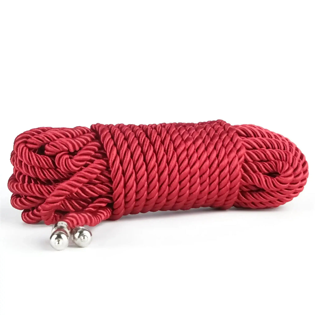 Lovetoy rebellion reign crimson 10m silky bondage rope in red with silver metal balls at each end