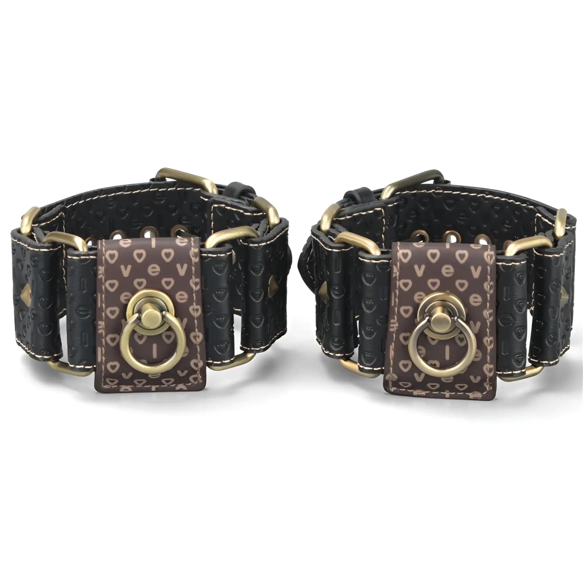 Black leather dog collars with gold hardware and brown plate featuring white i love text and hearts in lovetoy rebellion reign hogtie set