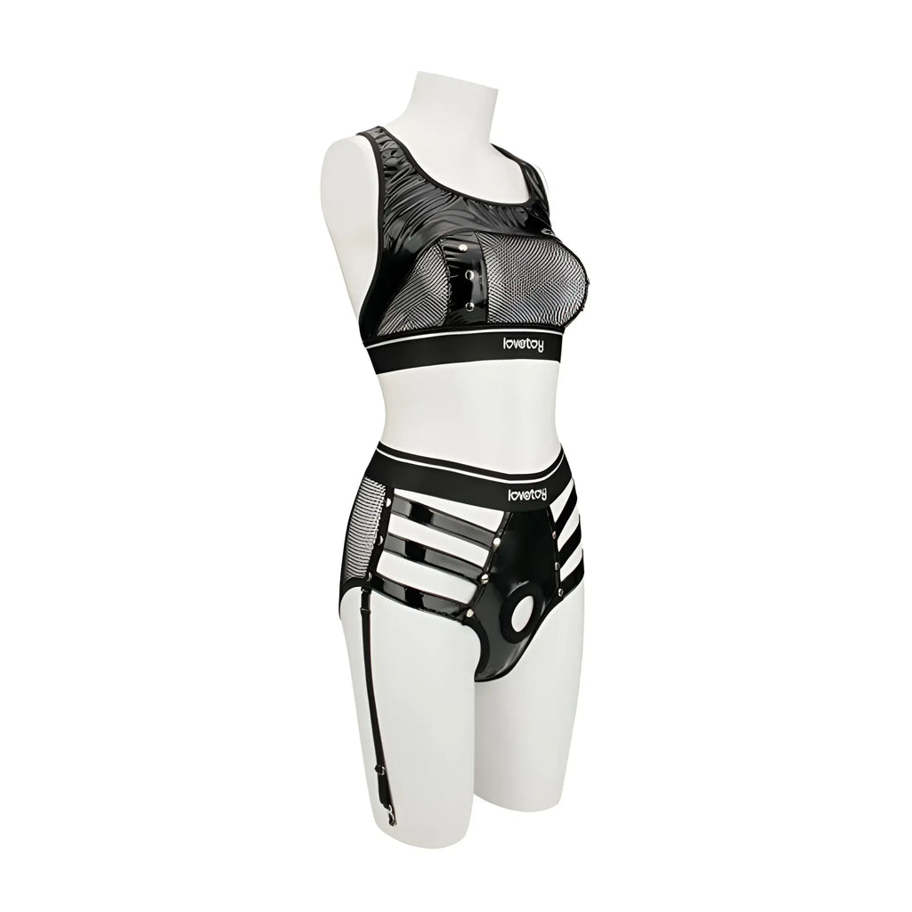 Black mesh and patent leather Lovetoy rebellion reign iconic harness strap on set with Lovetoys branding visible