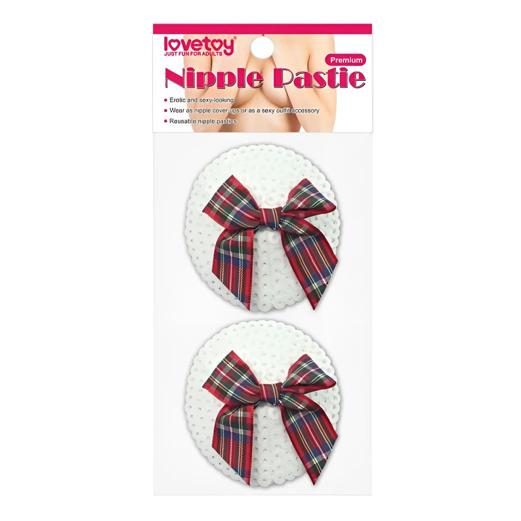 Lovetoy reusable sequin round nipple pasties with red green and blue plaid bow on white fabric in package