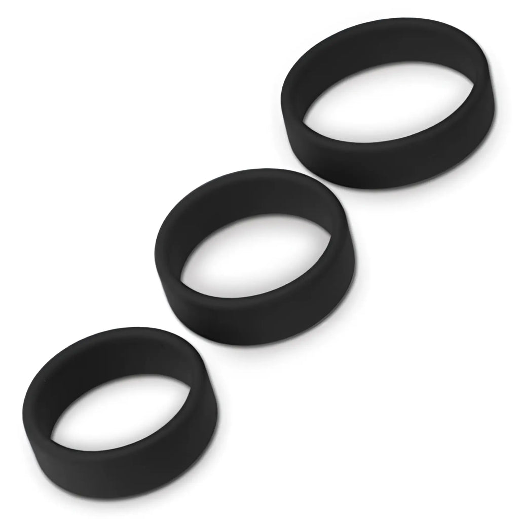 Three black silicone smooth cock rings in Lovetoy silicone 3 pc pro cock ring set for professional use