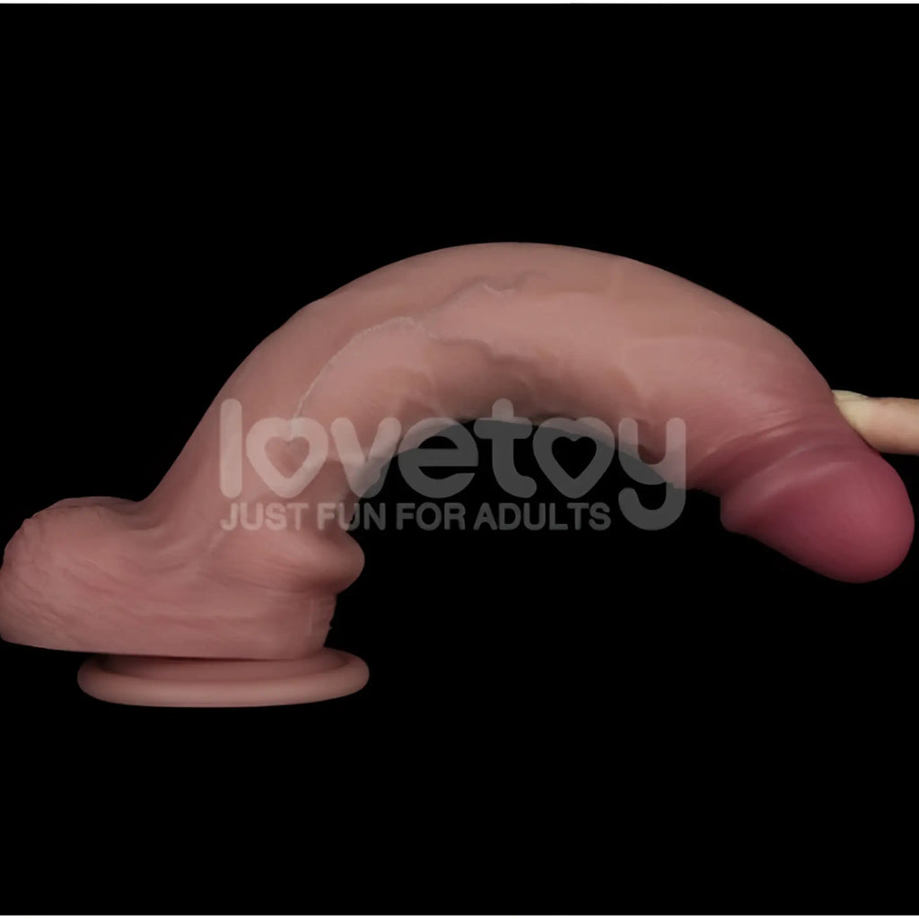Pink silicone lovetoy sliding skin pro dual layer 10in dong with curved realistic design and circular base