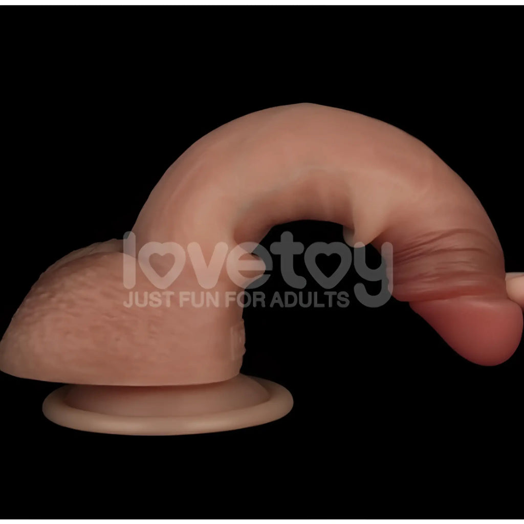 Pink silicone dual layer sliding skin pro dong with realistic curved design and suction base for adult use