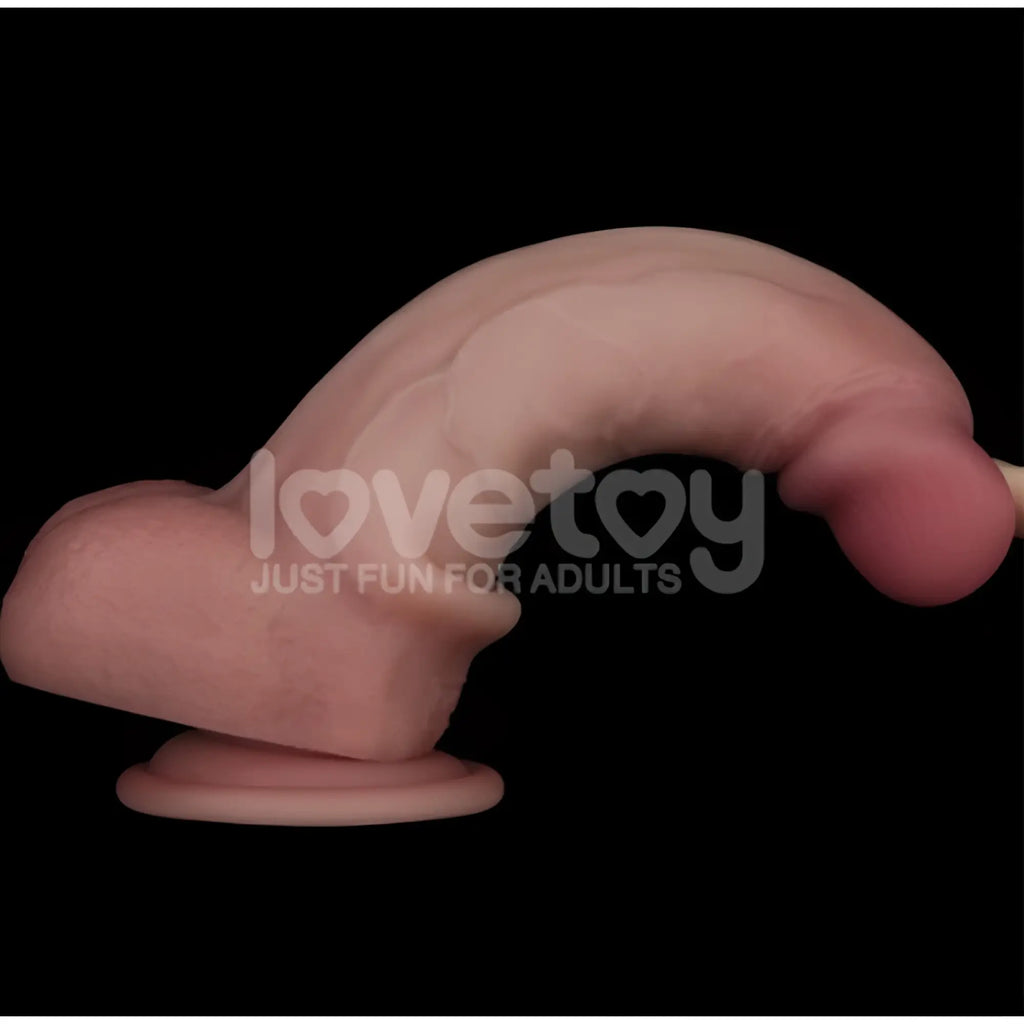 Pink silicone lovetoy sliding skin pro dual layer 8in dong with realistic texture and naturalistic design