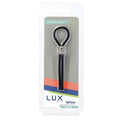 Black silicone adjustable cock tie with silver skull charm inside clear plastic packaging from LUX Active Tether
