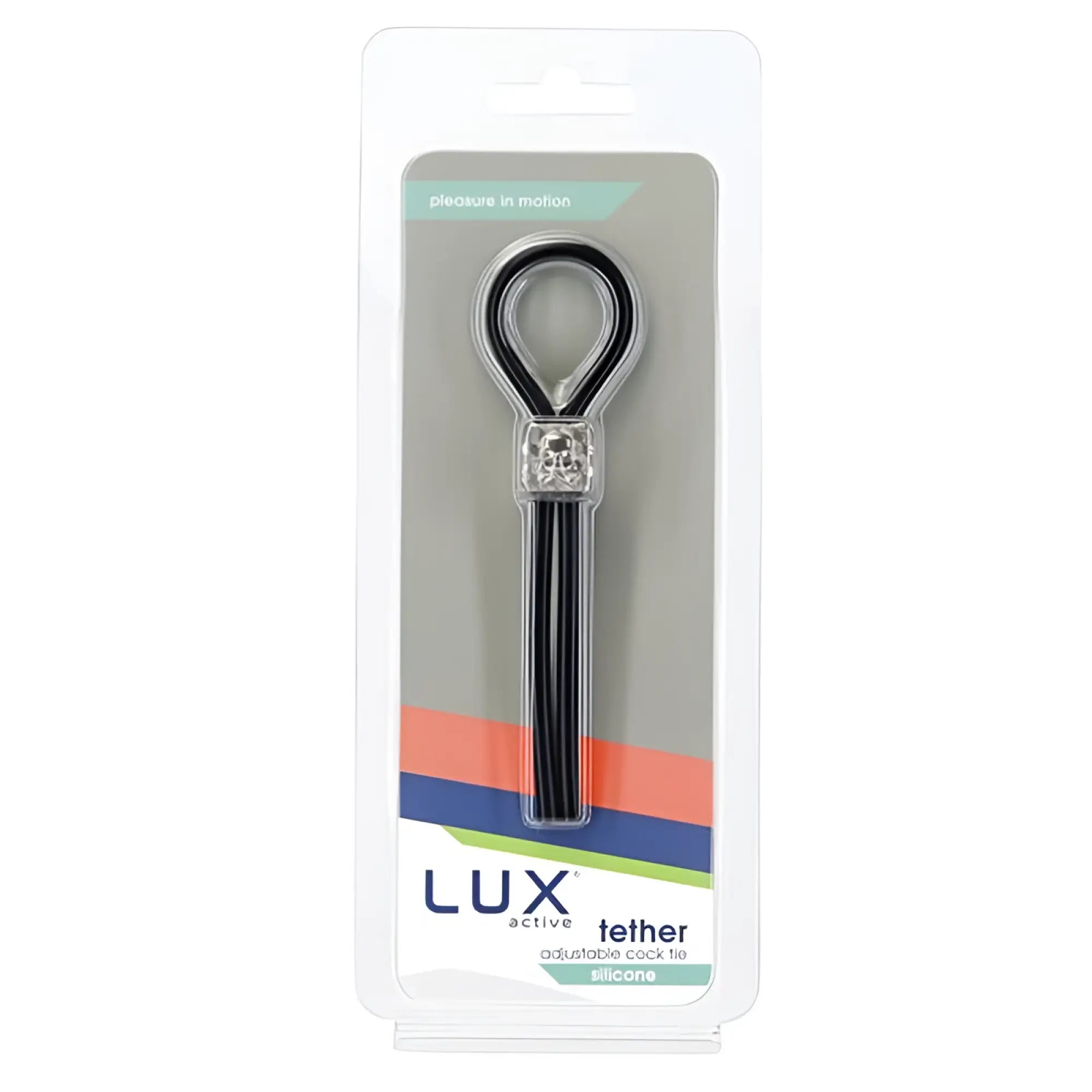 Black silicone adjustable cock tie with silver skull charm inside clear plastic packaging from LUX Active Tether