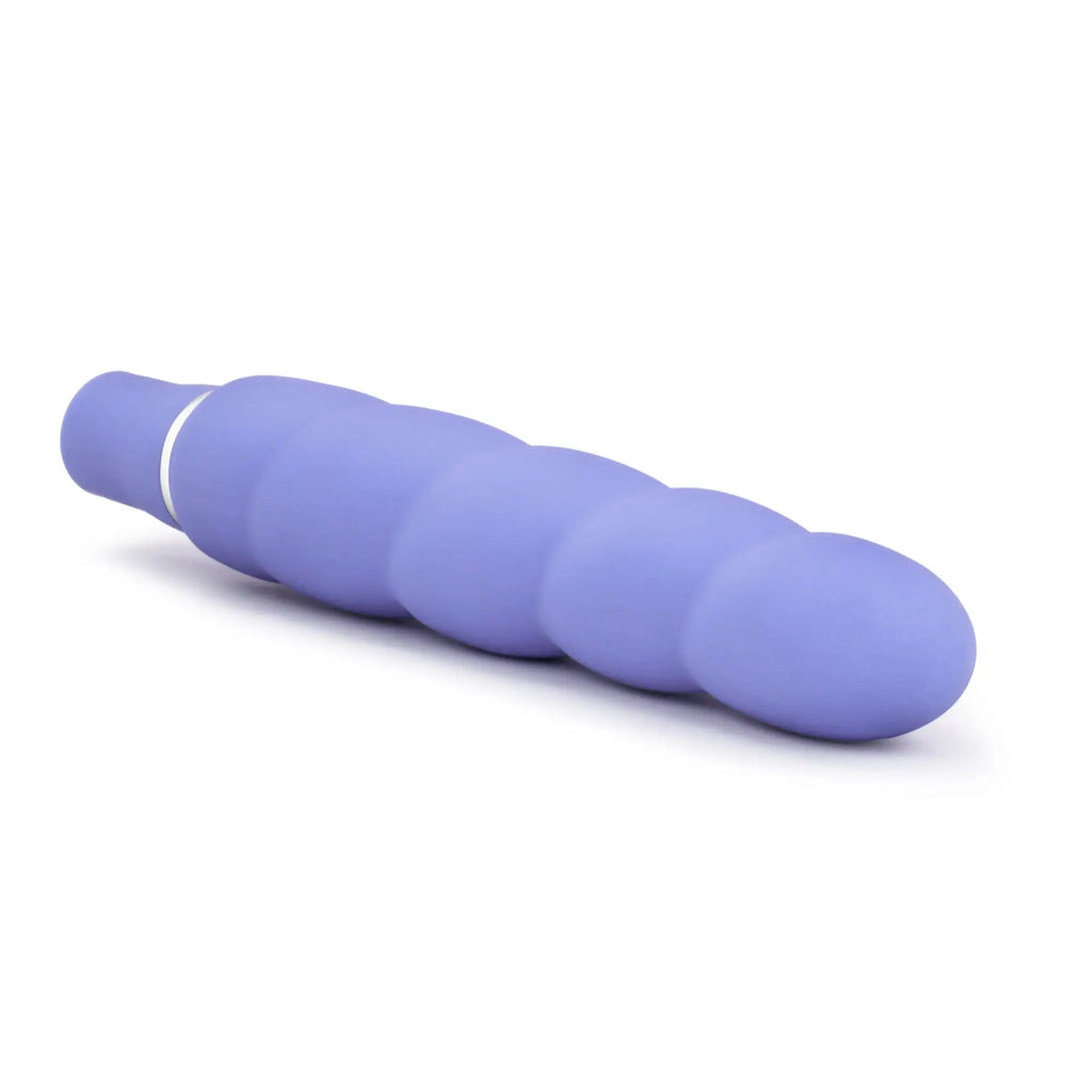 Luxe luxe Anastasia periwinkle purple silicone vibratory toy with segmented spiral design and white handle band
