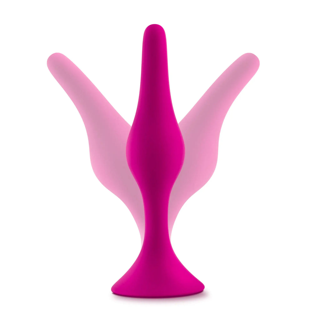Vibrant magenta silicone anal plug from luxe luxe beginner plug kit pink with sleek tapered design and flared wings