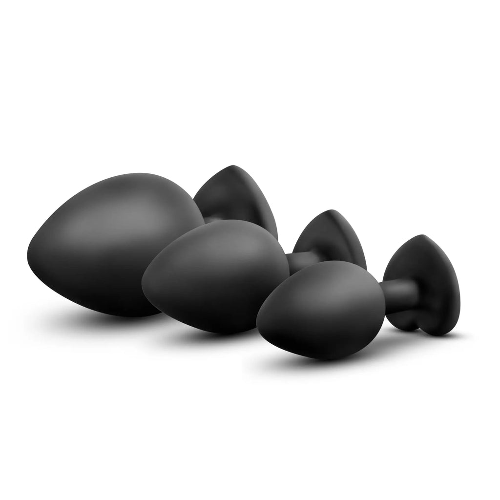 Set of three black silicone Luxe Luxe bling plugs with clear gems featuring smooth rounded heads and tapered stems