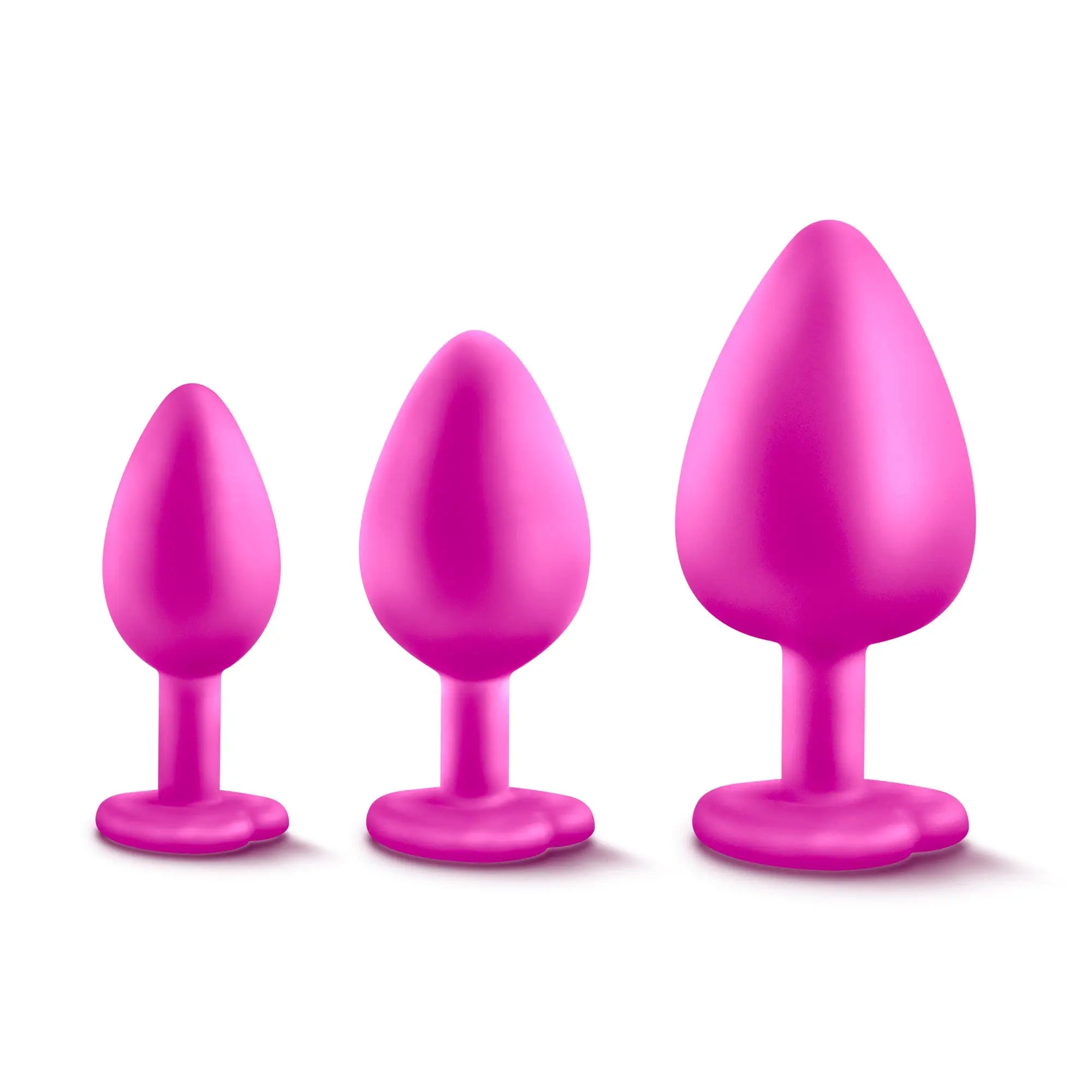 Set of three vibrant pink silicone luxe luxe bling plugs training kit with white gems and smooth rounded bases