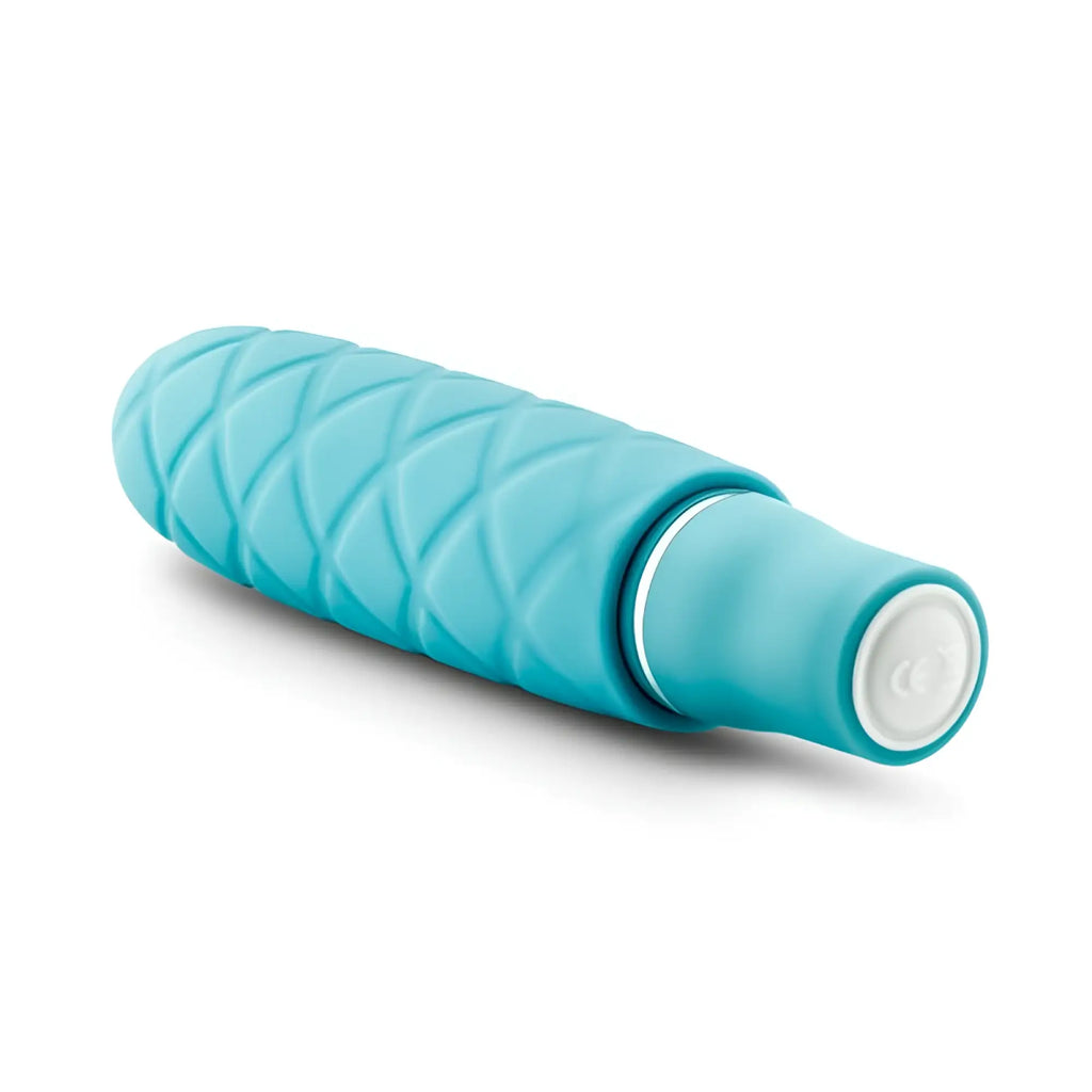 Teal silicone luxe luxe cozi mini aqua vibratory wand with textured diamond grip and white circular tip