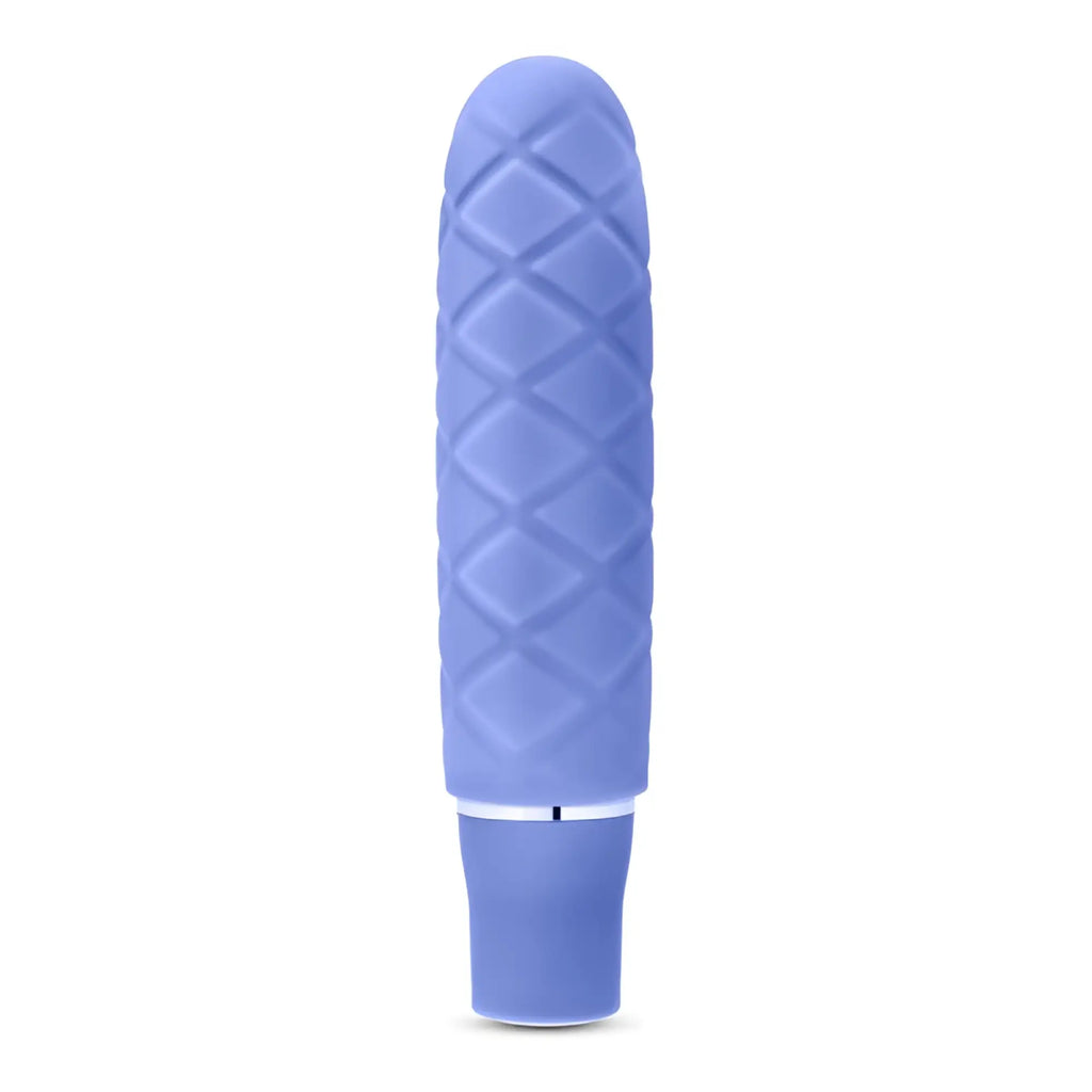 A lavender diamond-patterned silicone vibrator with a sleek metallic band near the base called Luxe Luxe Cozi Mini Periwinkle