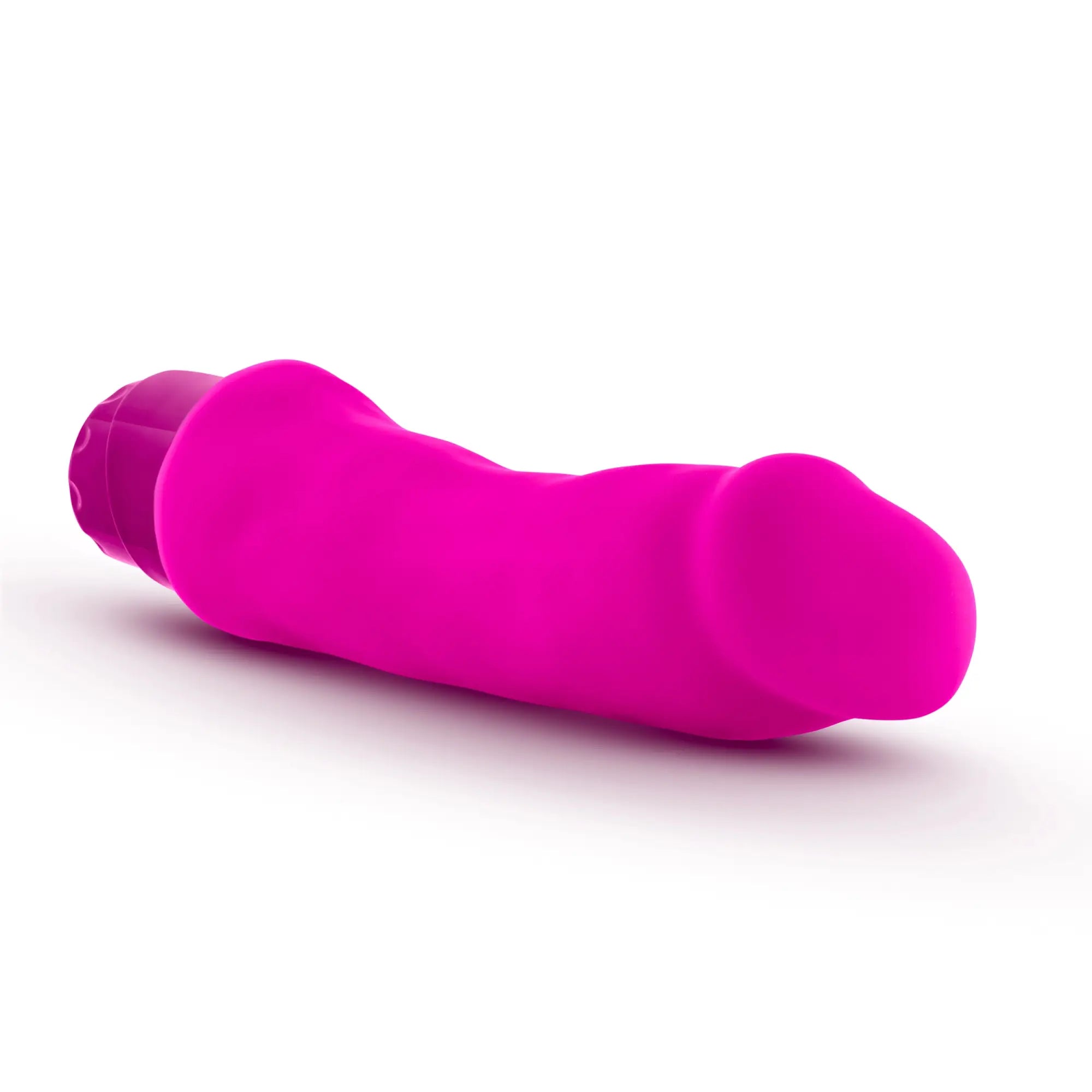 Luxe luxe marco pink vibrant pink silicone vibratory toy with smooth rounded design and textured grip area