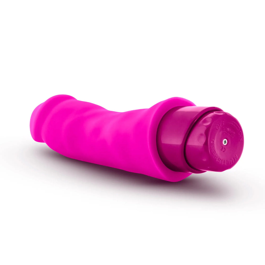 Luxe Luxe Marco pink vibrant pink silicone-wrapped vibrating toy with a glossy purple cap for personal pleasure
