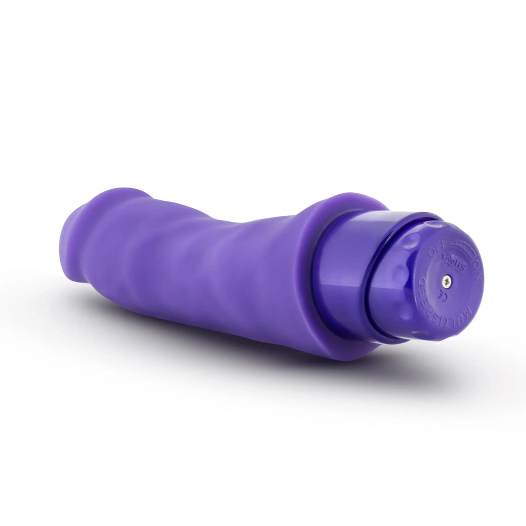 Luxe Luxe Marco purple silicone vibratory toy with textured grip and smooth rounded head for personal use