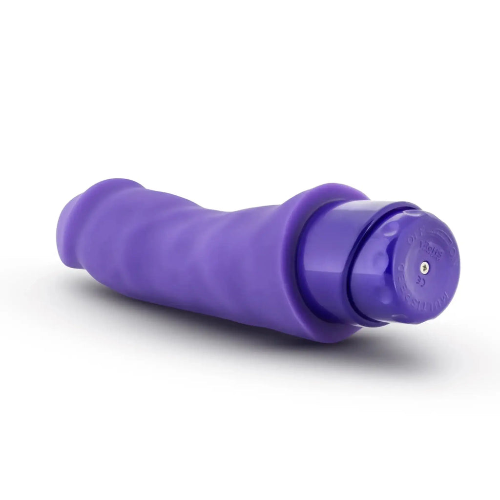 Luxe Luxe Marco purple silicone vibratory toy with textured grip and smooth rounded head for personal use
