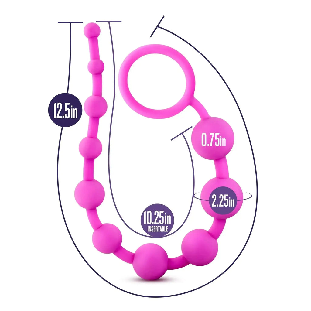 Pink silicone anal plug with ring and ten spherical beads of varying sizes from luxe silicone collection