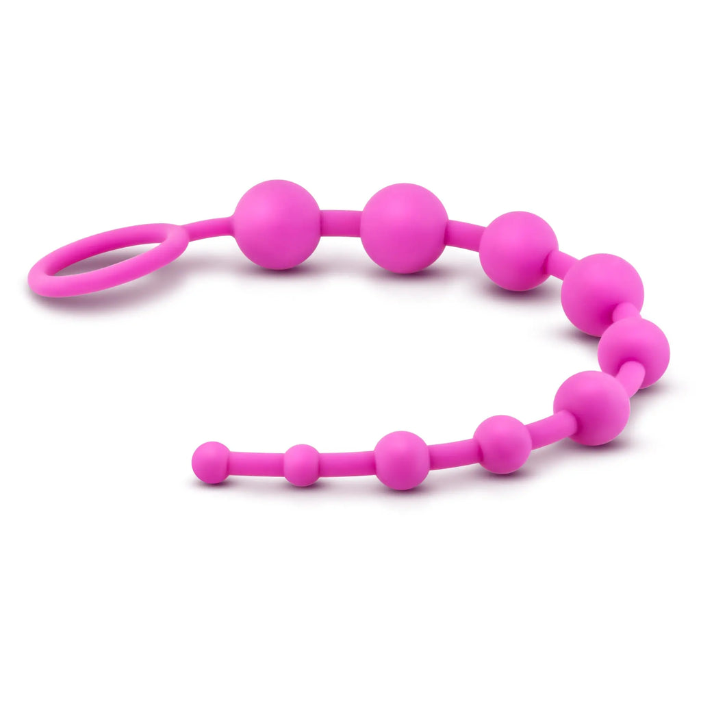 Luxe Luxe silicone 10 beads pink bright pink silicone bead train with a looped handle for sensory play