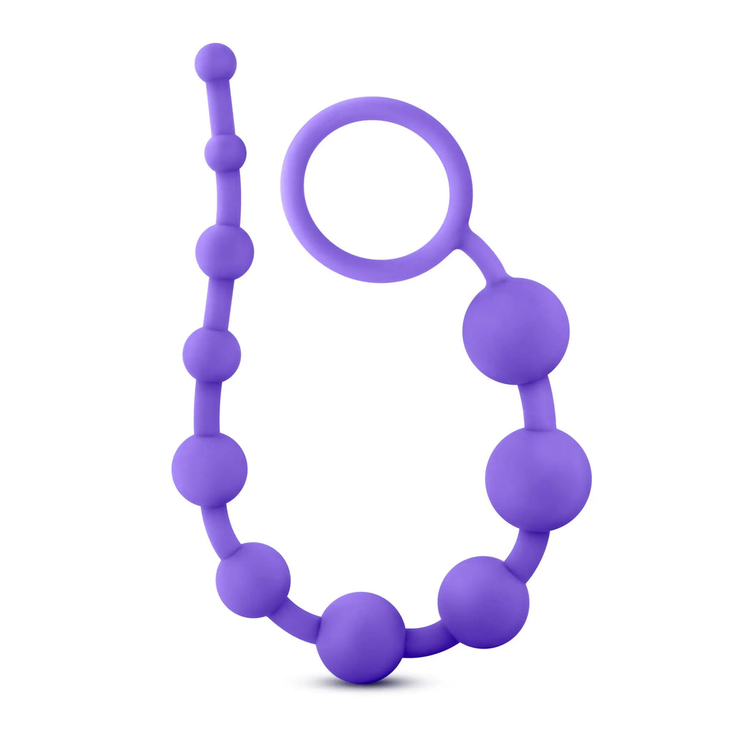 Luxe luxe silicone 10 beads purple train with looped handle made of soft purple silicone beads for sensory play